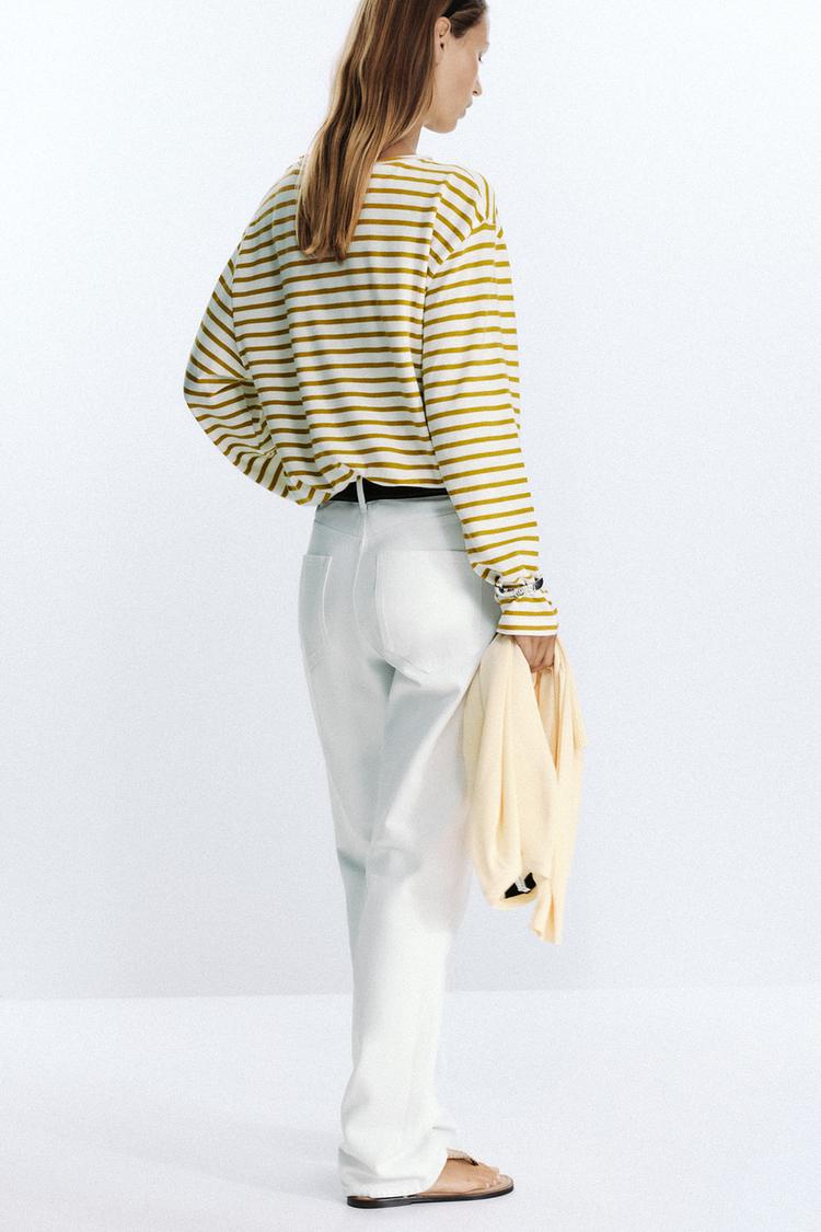 Randig långärmad topp med båtringning