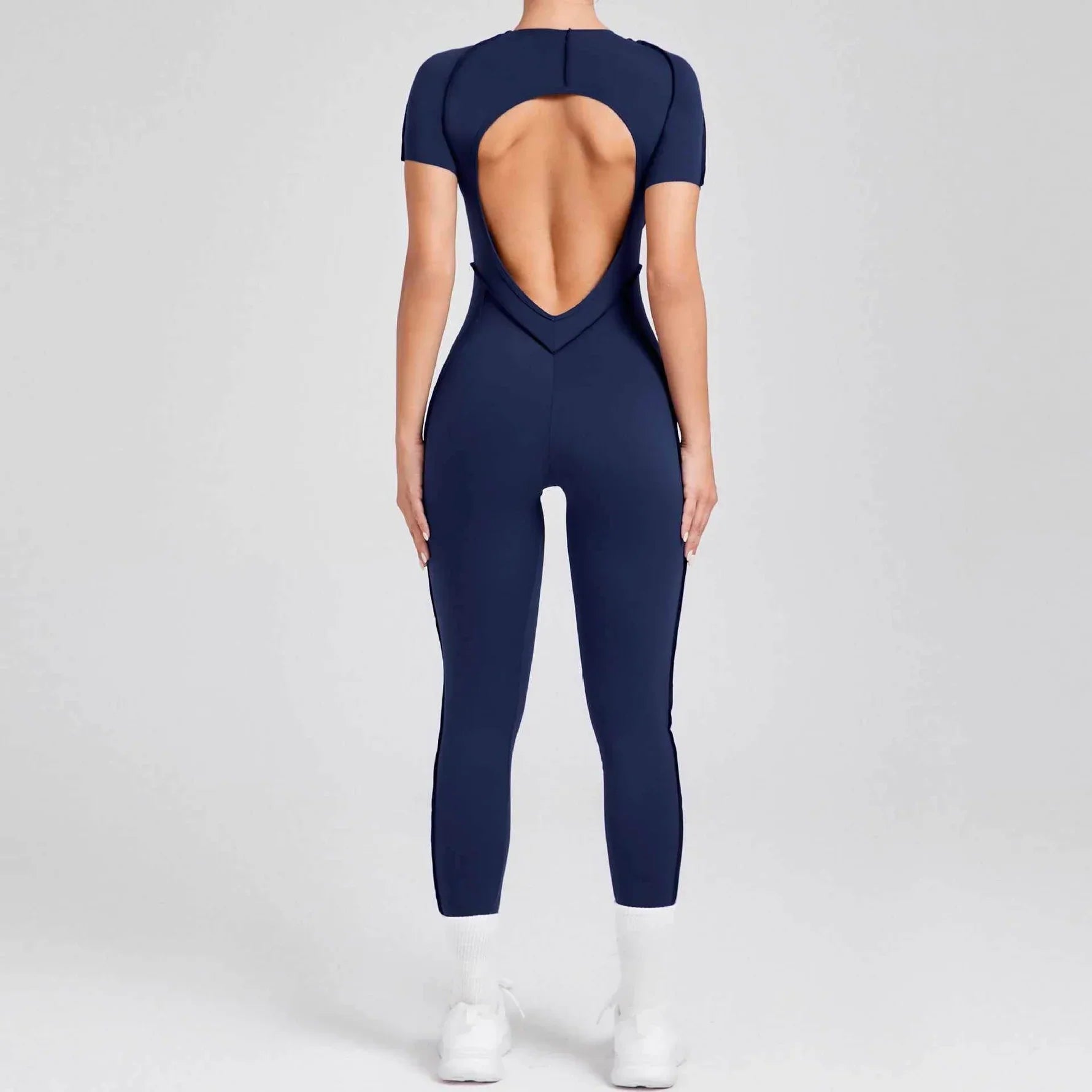 Sportig jumpsuit med korta ärmar