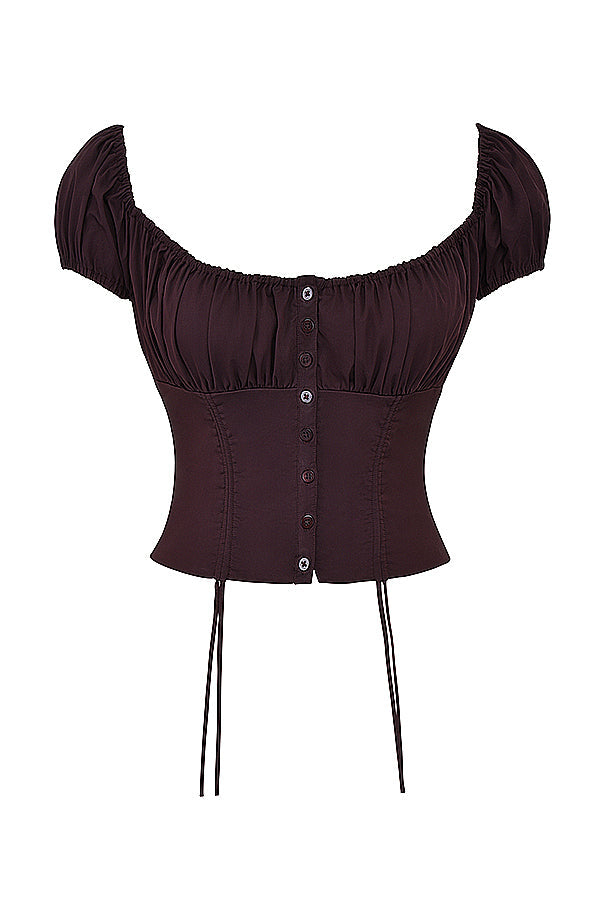 Ruffad topp i djupbrunt och midikjol med rufs