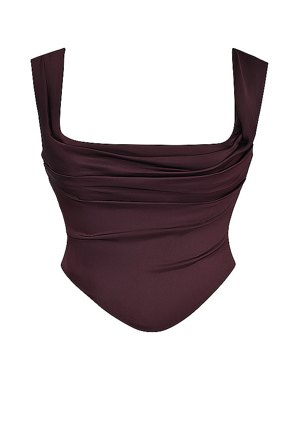 Korsett med spetsrygg och lång kjol