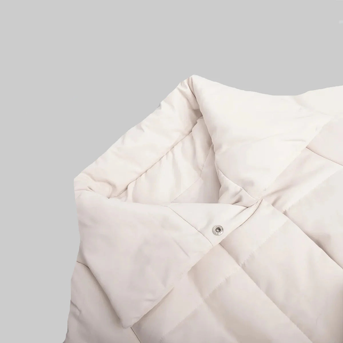 Lång omlott pufferkappa med bälte och stor sjalkrage