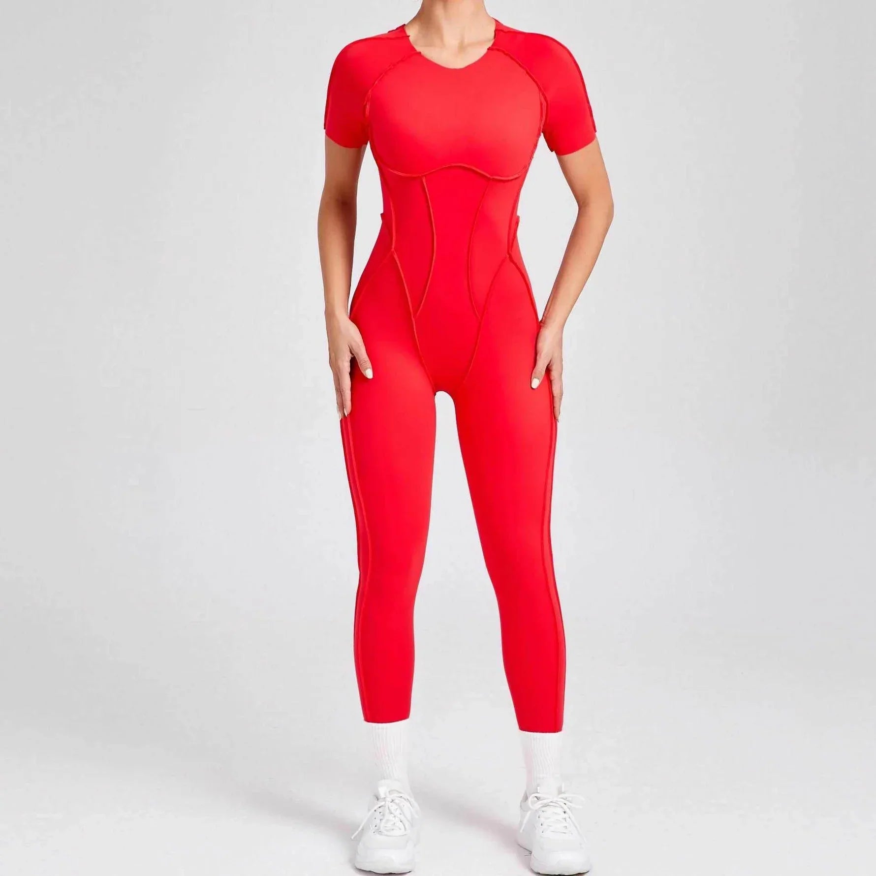 Sportig jumpsuit med korta ärmar