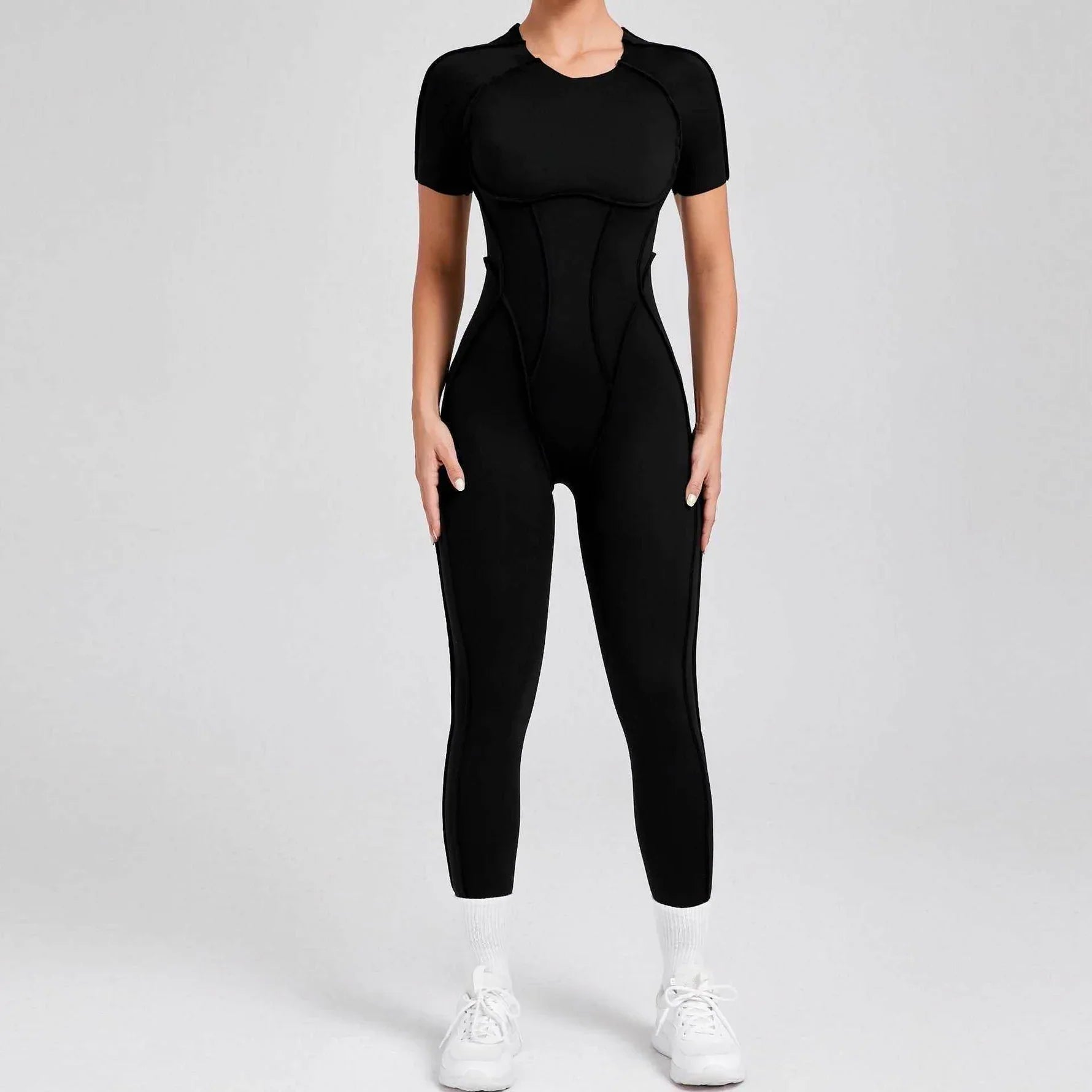 Sportig jumpsuit med korta ärmar