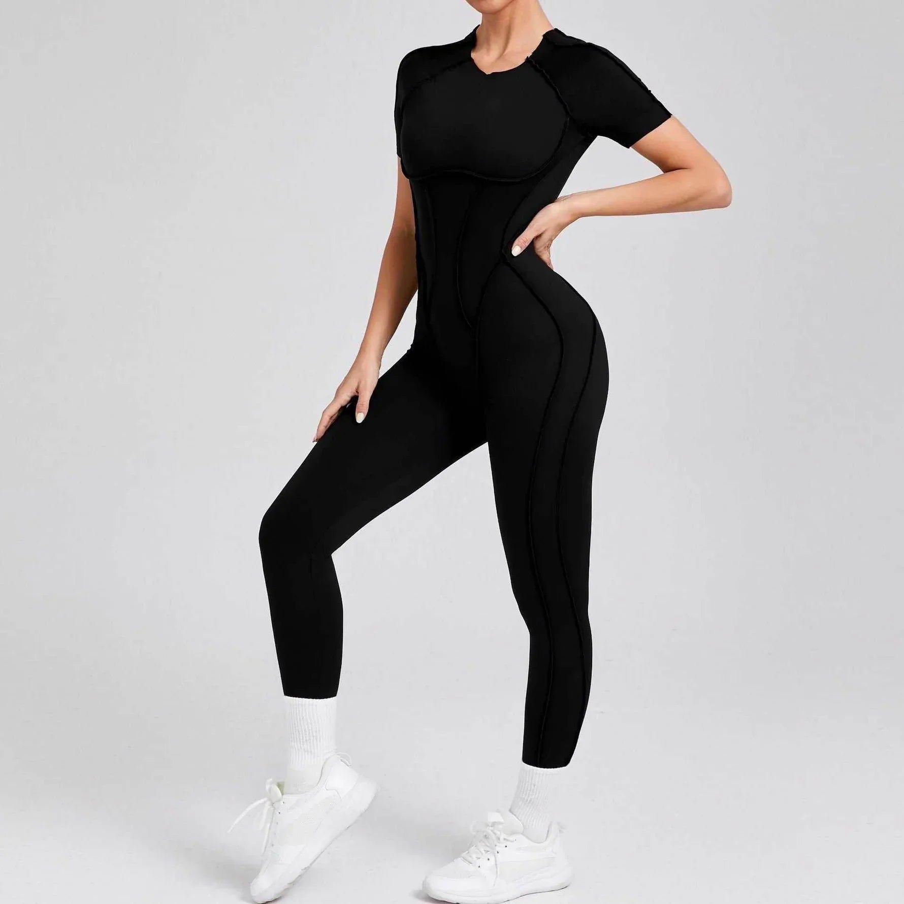 Sportig jumpsuit med korta ärmar