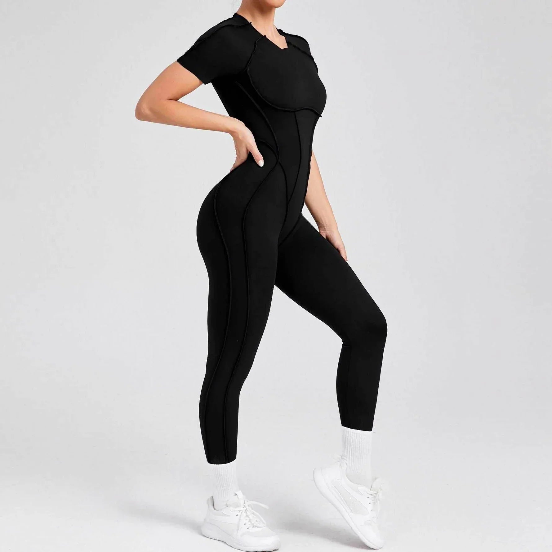 Sportig jumpsuit med korta ärmar