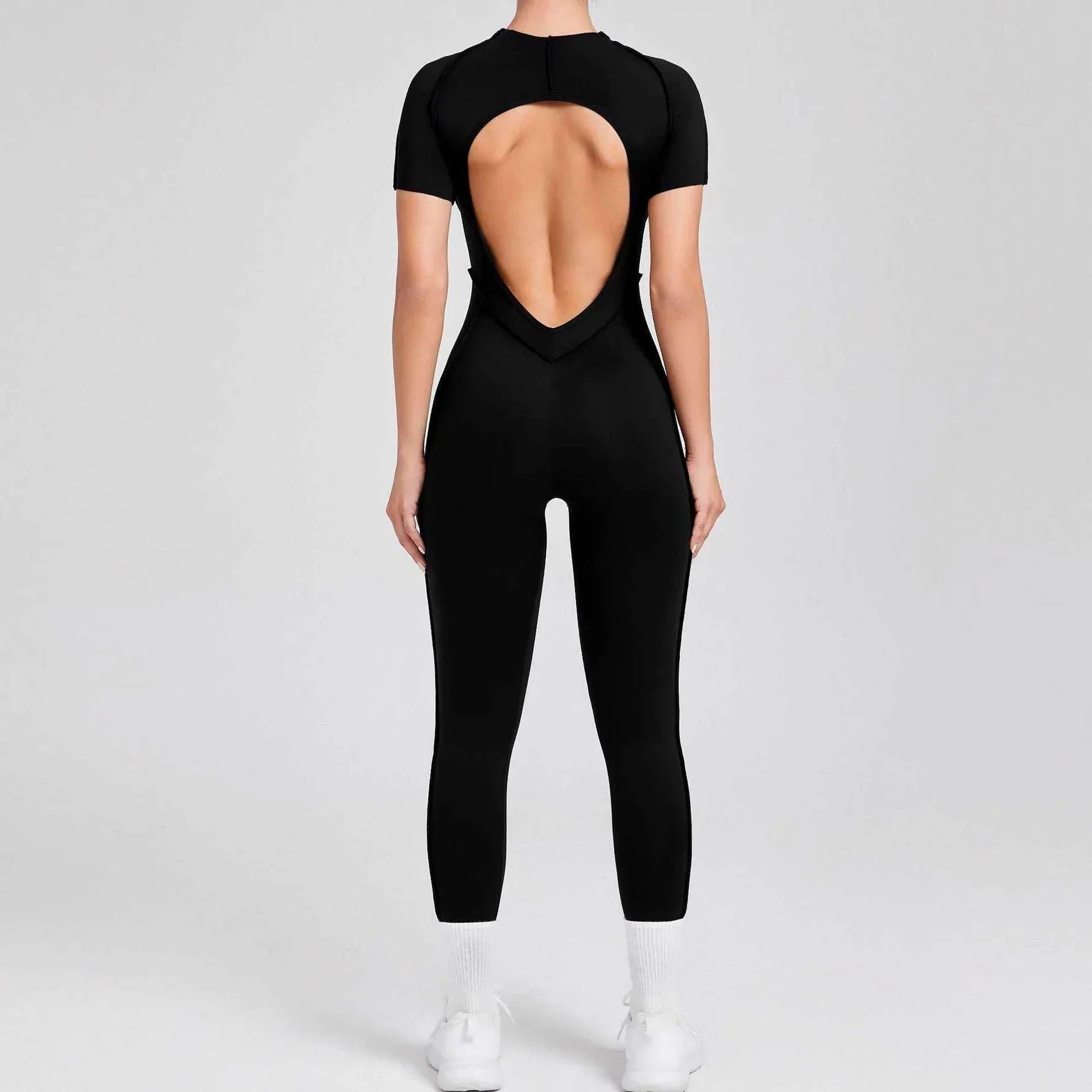 Sportig jumpsuit med korta ärmar