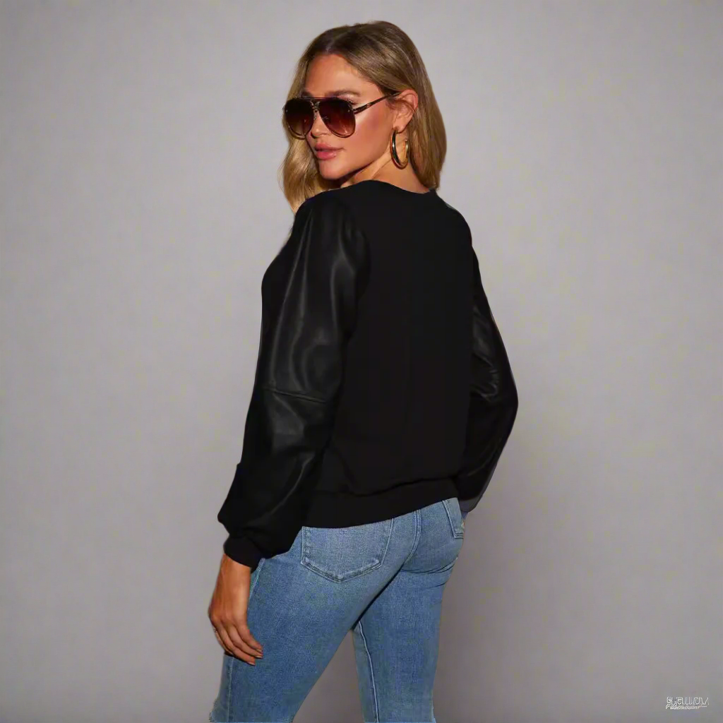 Lädersömmar långärmad rund hals