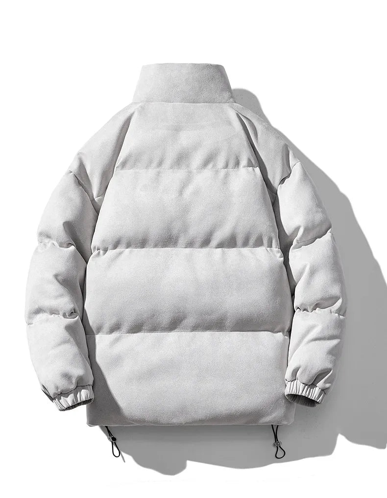 Kort pufferjacka med ståkrage och dragsko i fållen