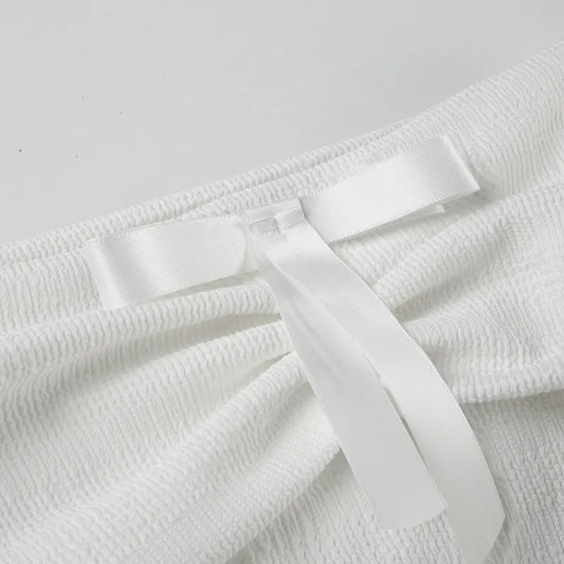 Vit baraxlad topp med knytdetalj