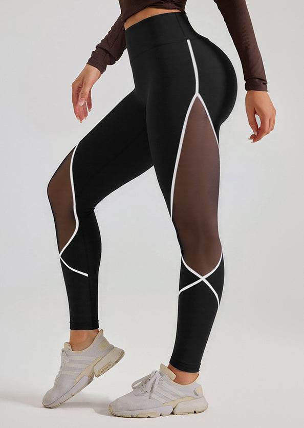 Svarta leggings med vita detaljer och mesh-detaljer