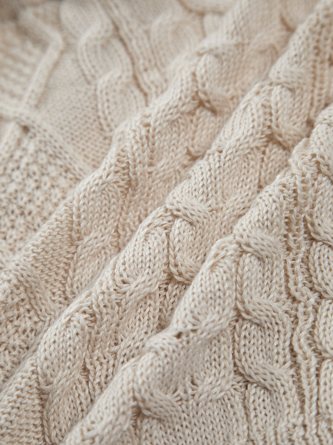 Stickad halterneck-topp med kabelmönster