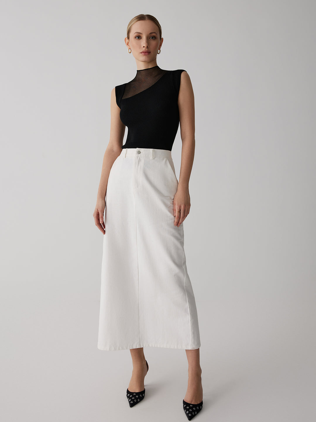 Ärmlös ribbstickad topp med meshdetalj