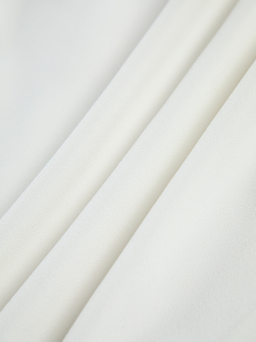 Asymmetrisk draperad topp med kort ärm