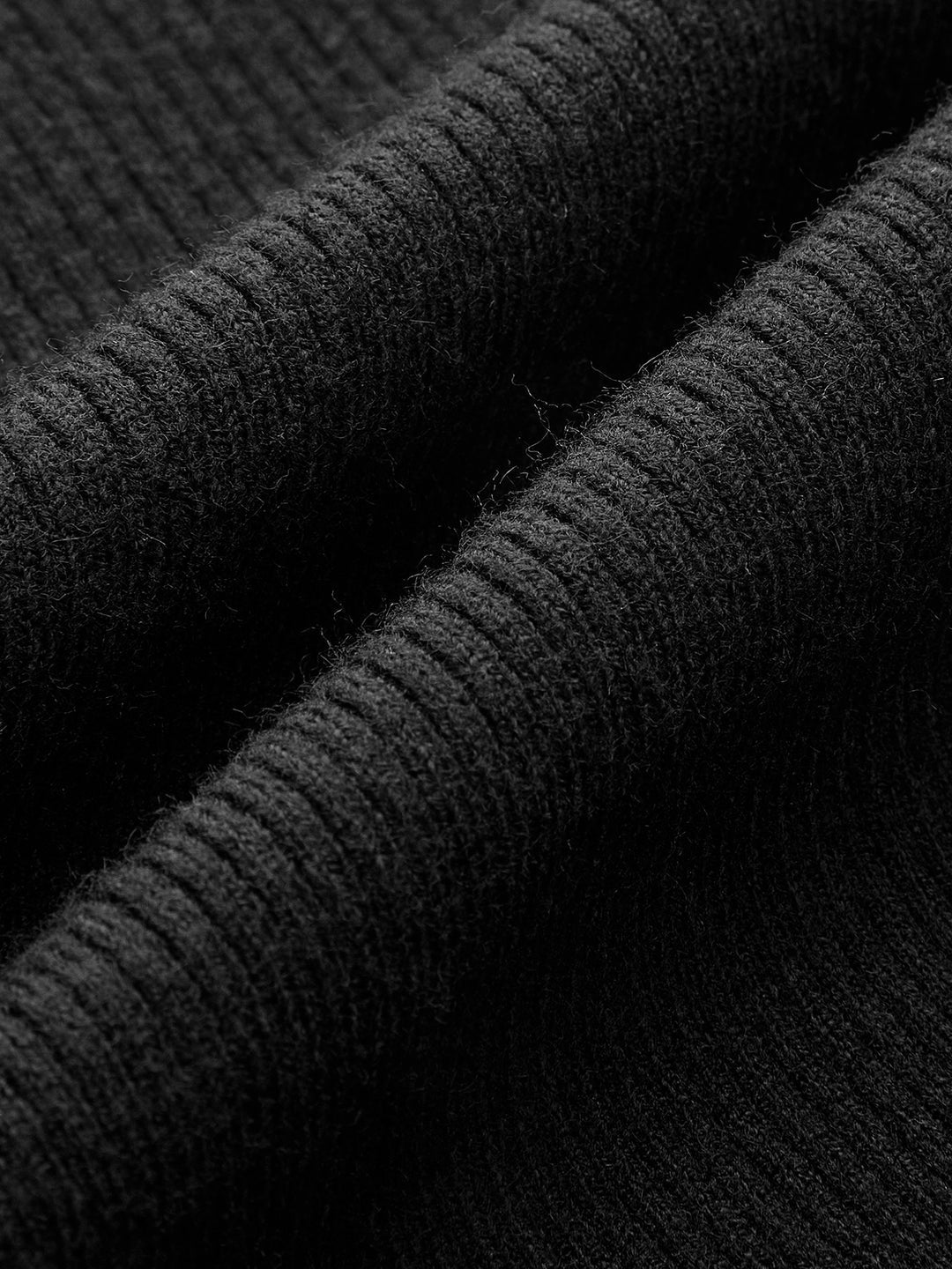 Ärmlös ribbstickad topp med meshdetalj