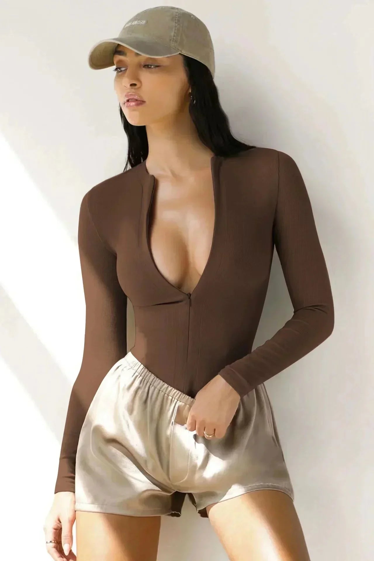 Bodysuit med dragkedja och långa ärmar