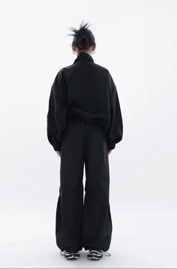 Svart oversized sportdräkt