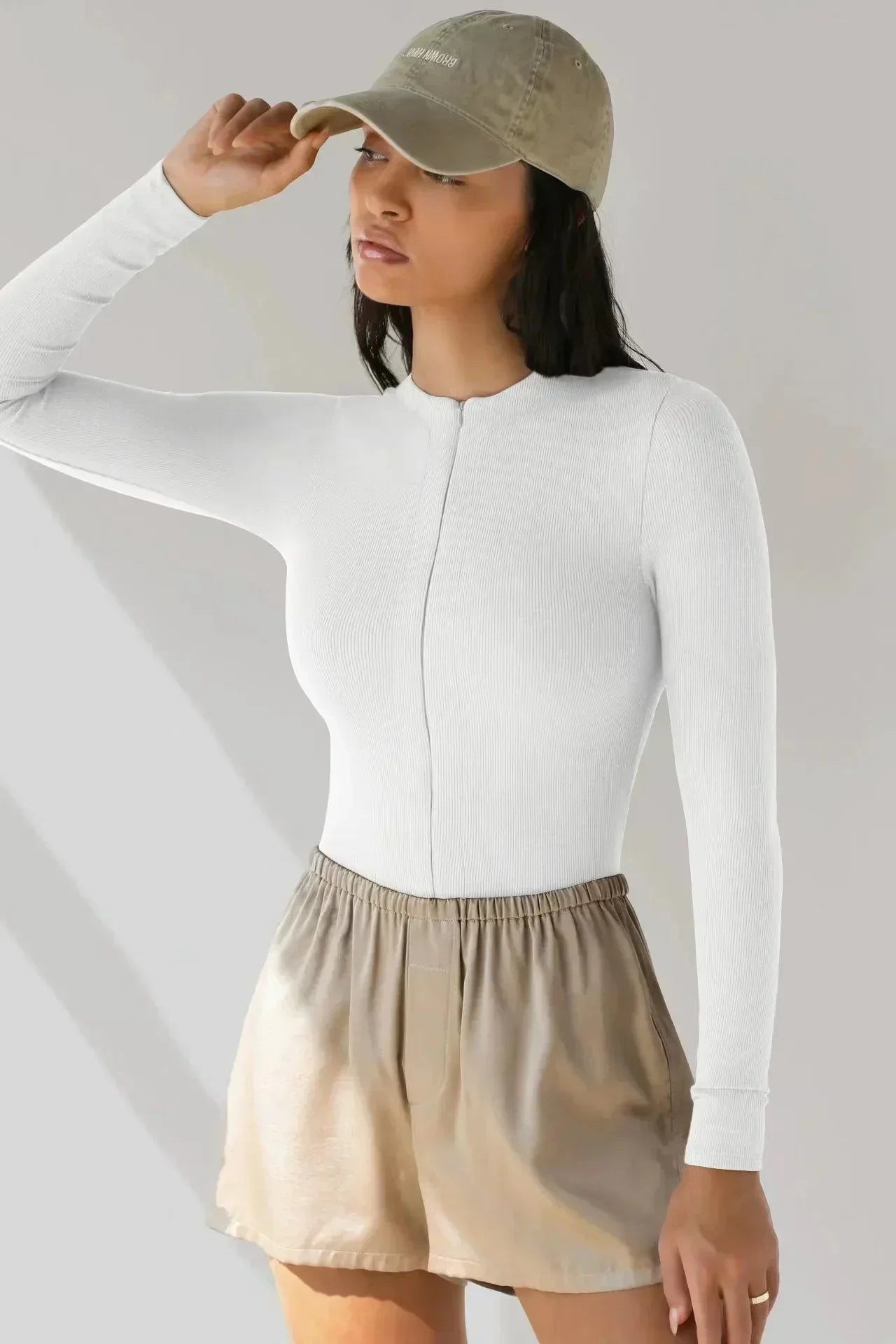 Bodysuit med dragkedja och långa ärmar