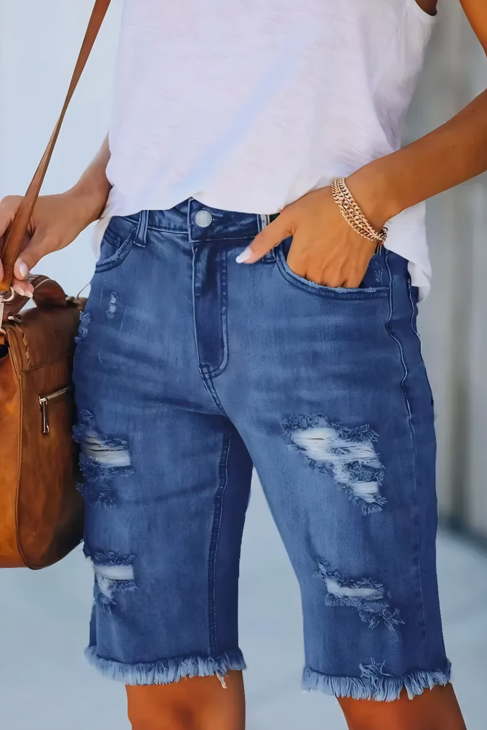 Slitna, beskurna jeans