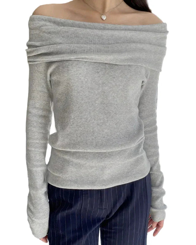 Ljusgrå baraxlad topp med vikt kant