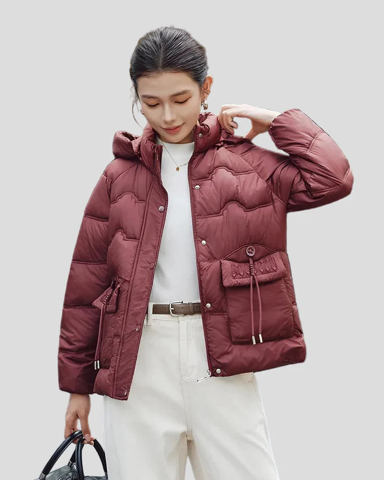 Pufferjacka med huva och fickor med dragsko