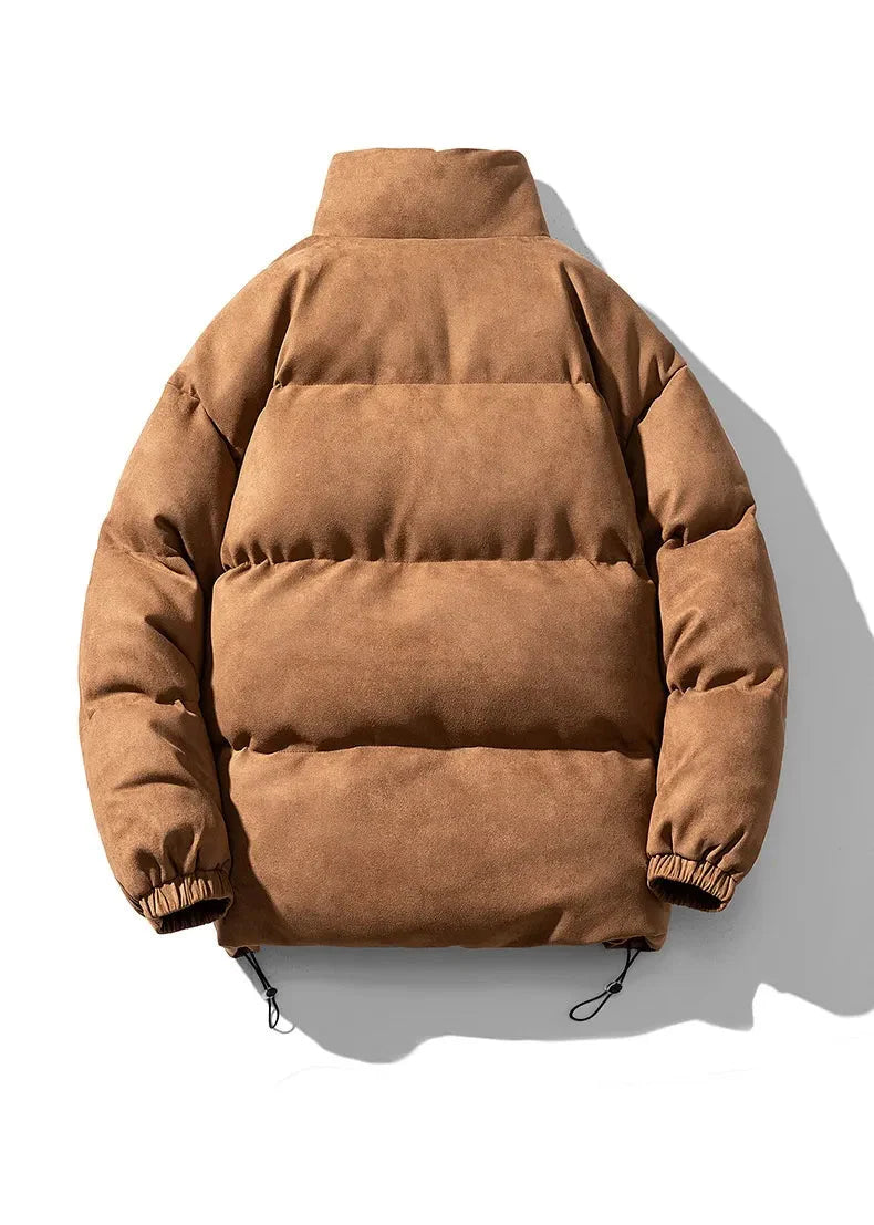 Kort pufferjacka med ståkrage och dragsko i fållen