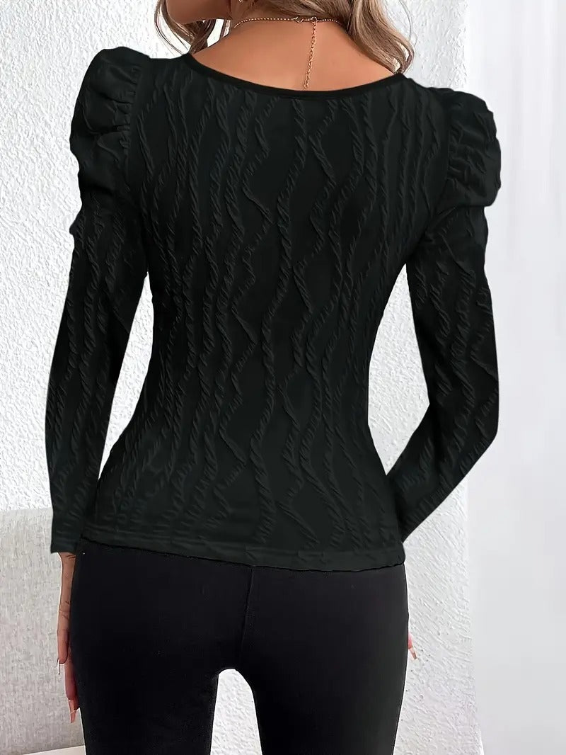 Topp med fyrkantig ringning och puffärmar