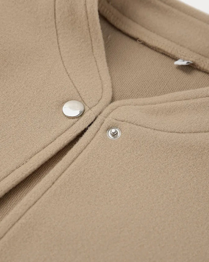 Beige kort bomberjacka med resårkant