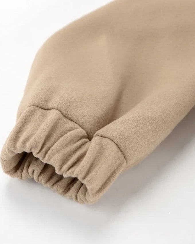 Beige kort bomberjacka med resårkant