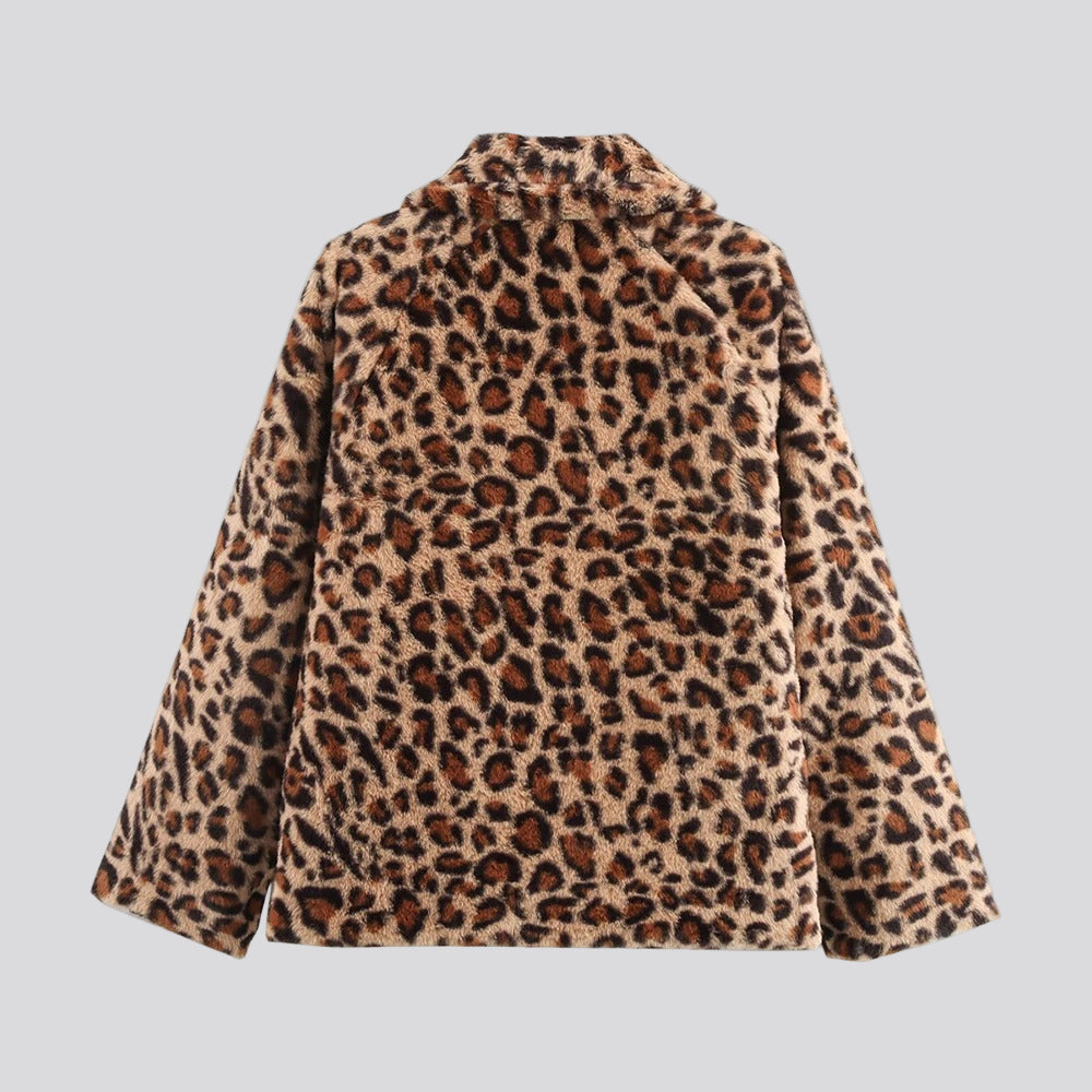 Krämfärgad tvåsidig quiltad jacka med leoparddetaljer