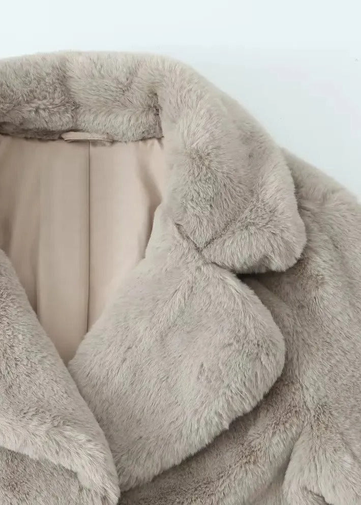 Teddy-kappa med slag och rymlig passform