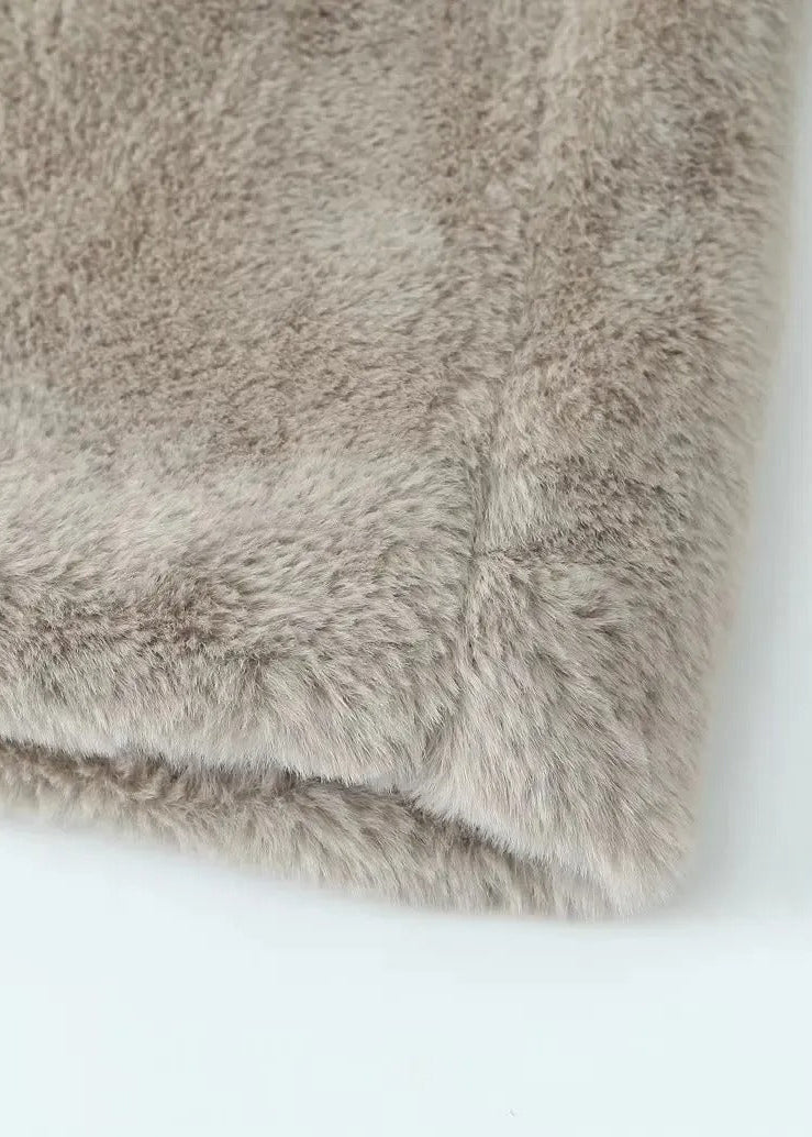 Teddy-kappa med slag och rymlig passform