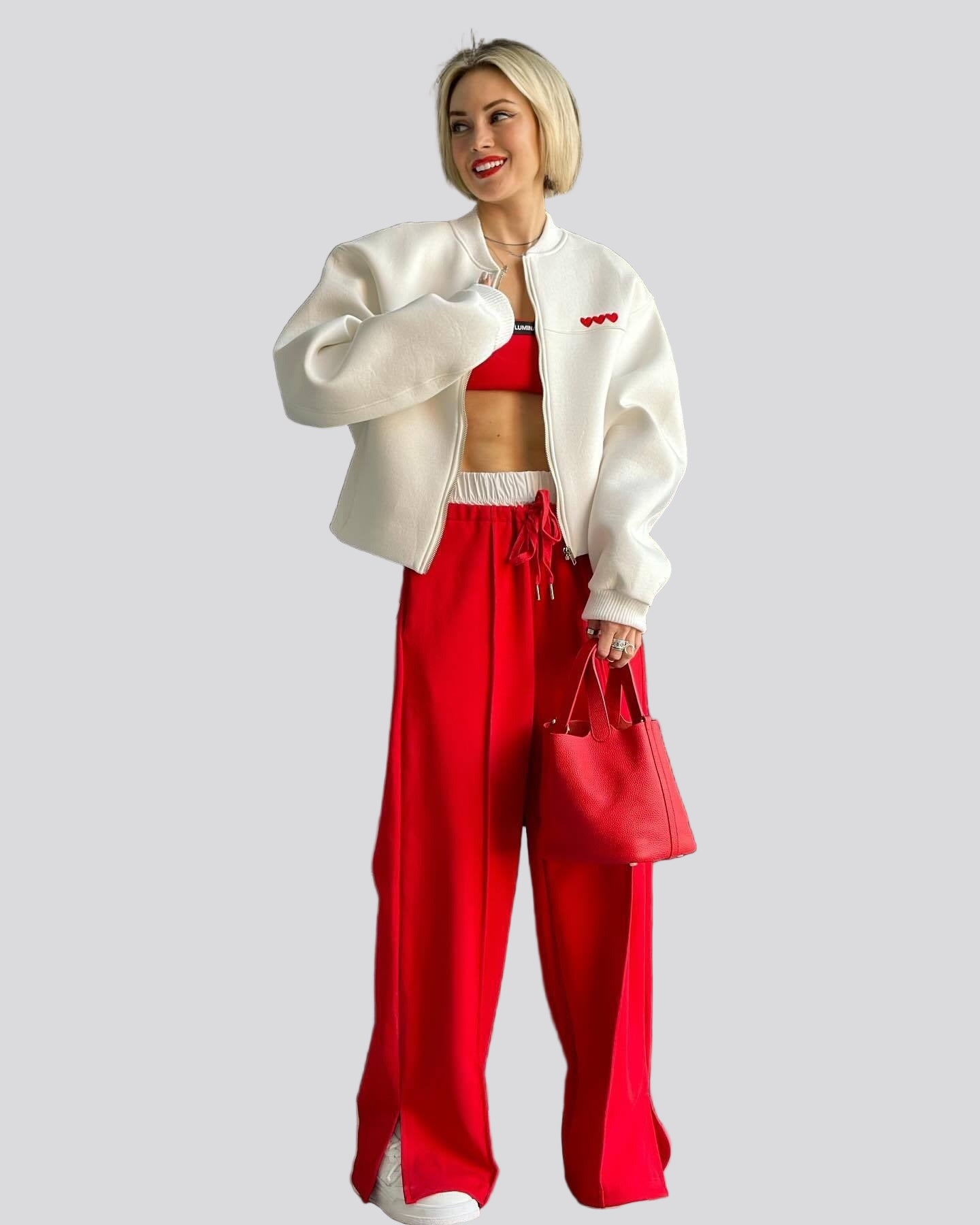 Oversize zipjacka med hjärtdetalj