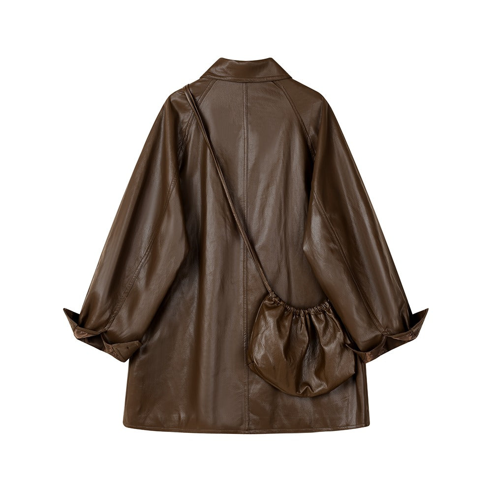 Lång avslappnad kappa med knäppning