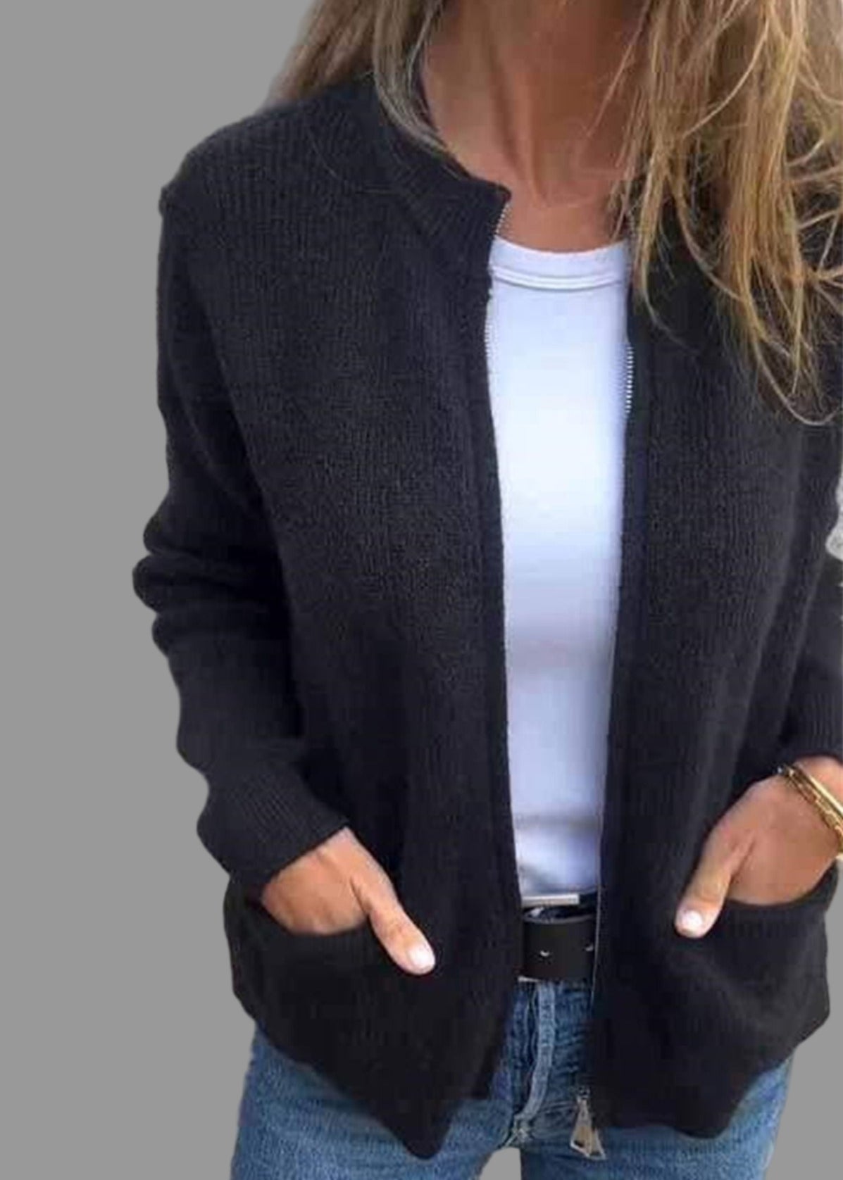 Stickad kofta med dragkedja och fickor