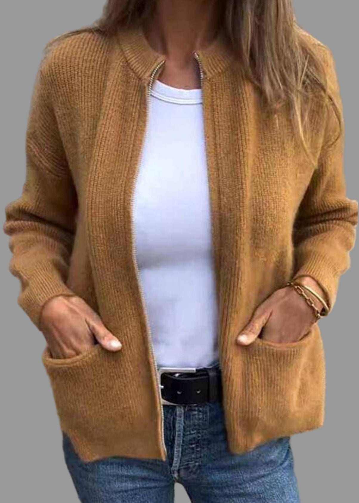 Stickad kofta med dragkedja och fickor