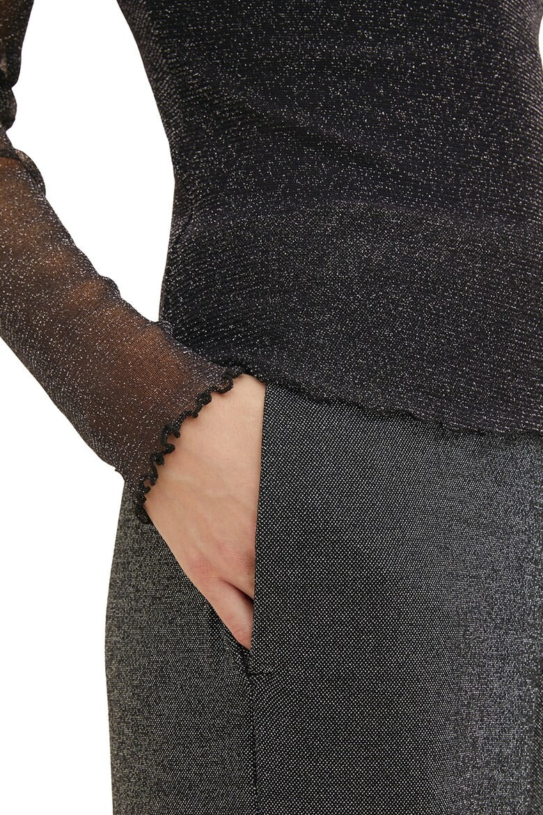 Svart glittrig topp med transparenta ärmar