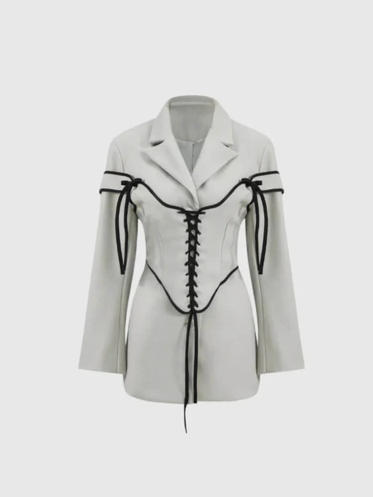 Ljusgrå kavaj med svart korsettdetalj i minilängd