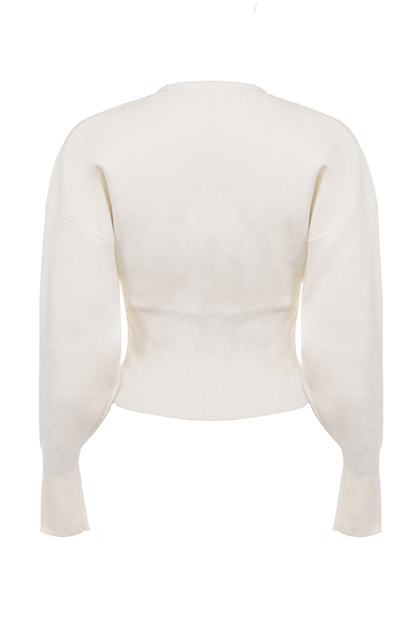 Vit stickad cardigan med V-hals och byxor