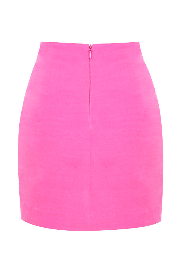 Korsettöverdel i rosa linne med puffärmar och minikjol