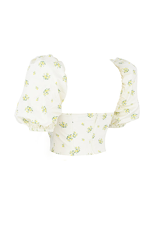 Elfenbensfärgad korsett med blommor och puffärmar