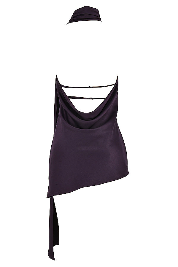 Rygglös klänning med omlottringad halsringning