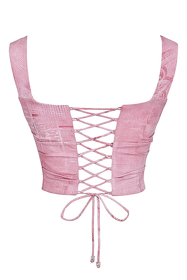 Avslappnad korsett med rosa tryck