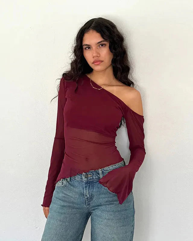 Asymmetrisk genomskinlig one-shoulder-topp