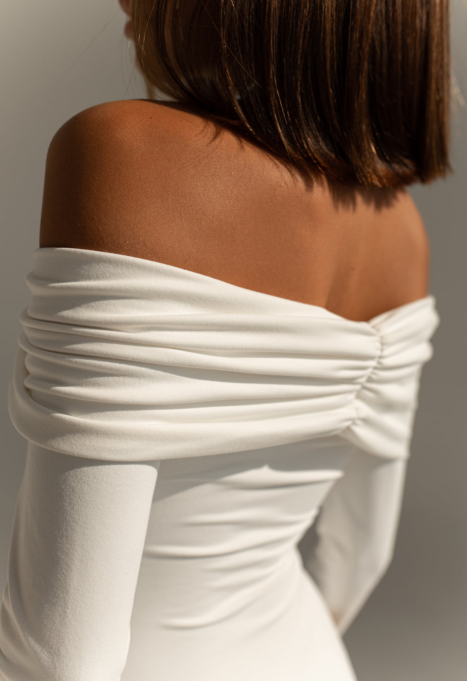 Vit off-shoulder Bodysuit med Långa Ärmar