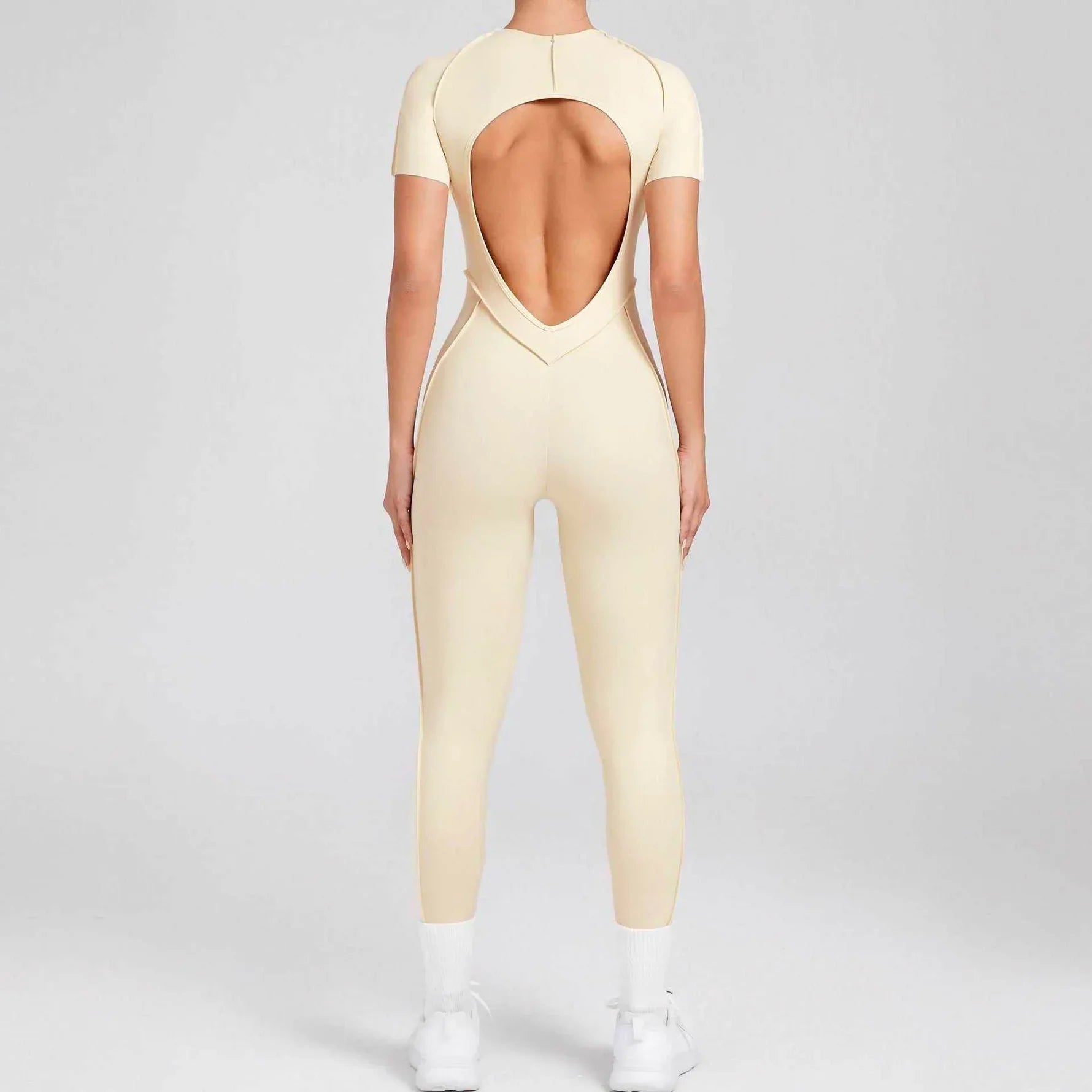 Sportig jumpsuit med korta ärmar