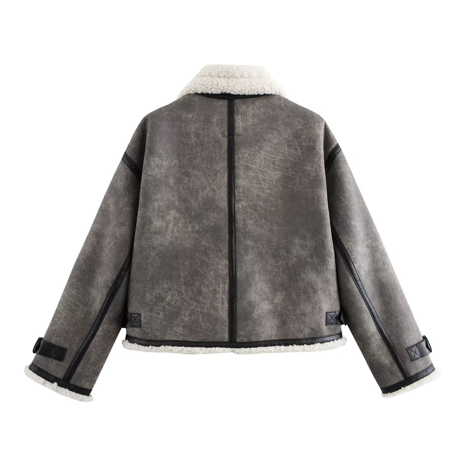 Kort jacka med ståkrage och spänndetaljer