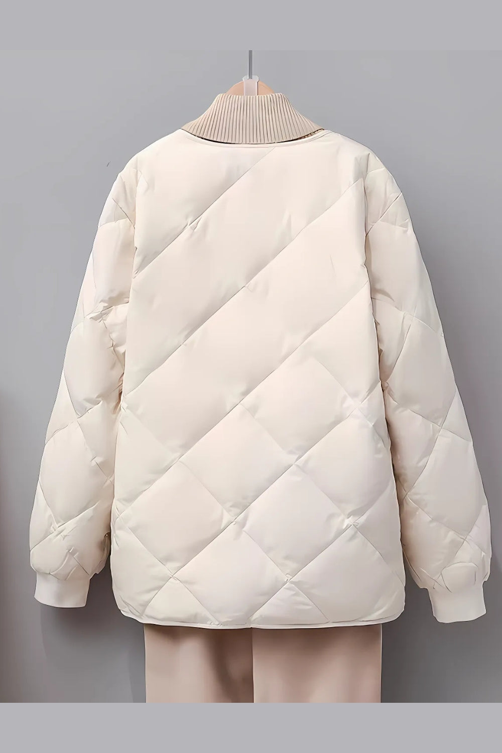 Quiltad jacka med diamantmönster