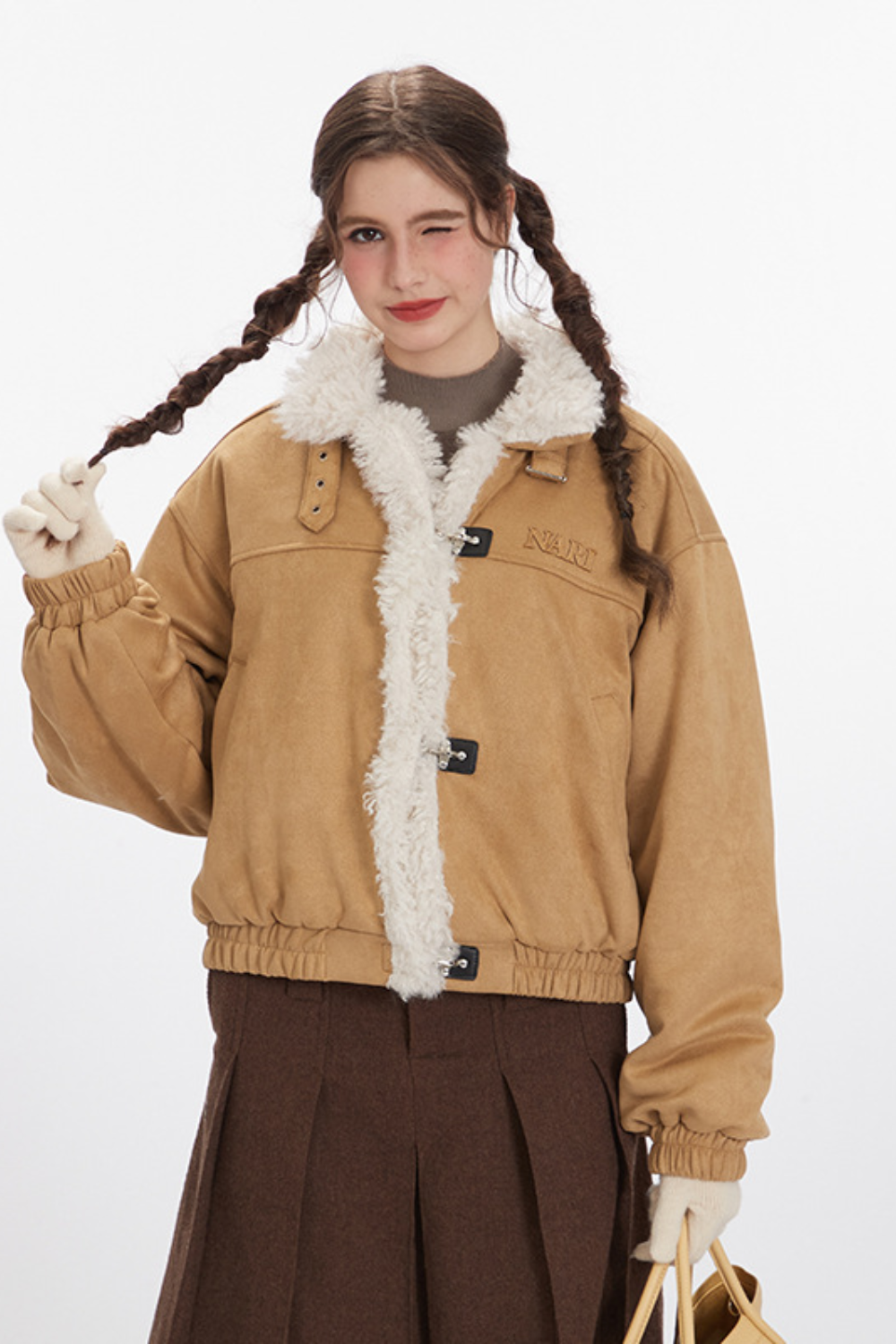 Teddyjacka med spänndetaljer