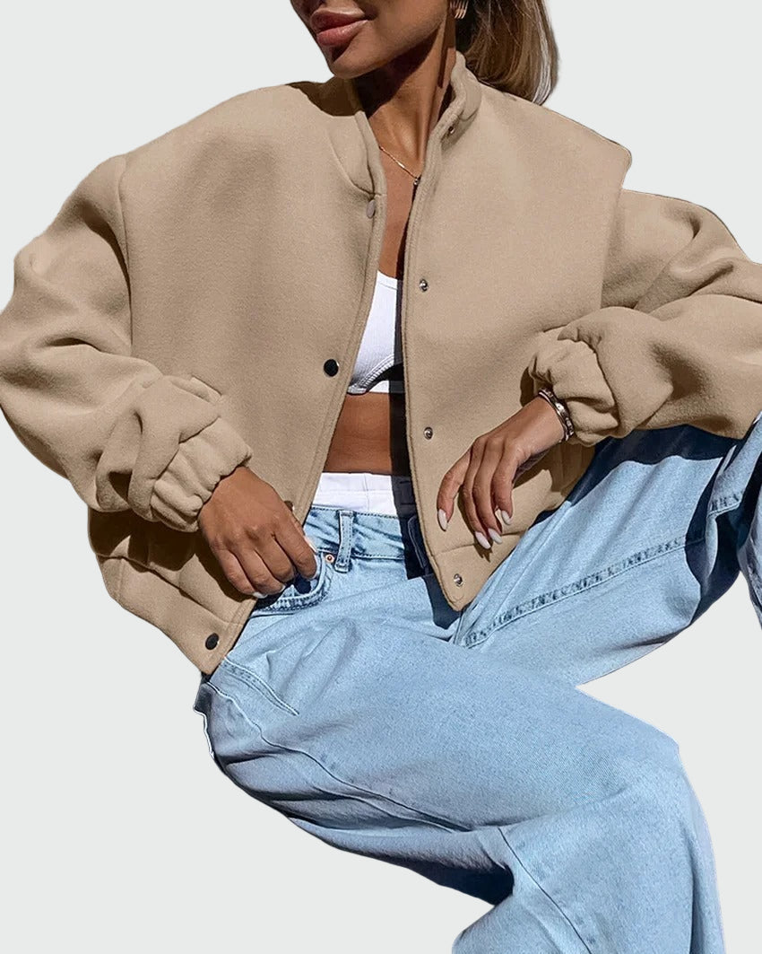 Beige kort bomberjacka med resårkant