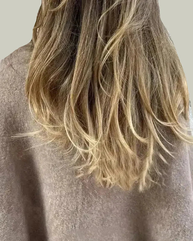 Öppen kofta med mjuk yta och vida ärmar